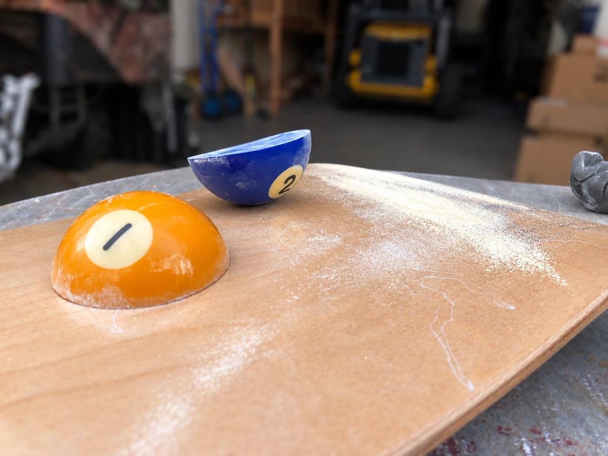 Early Whirly Board built from a cut pool ball
