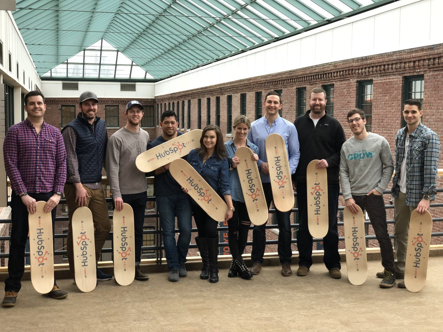 HubSpot team with their boards