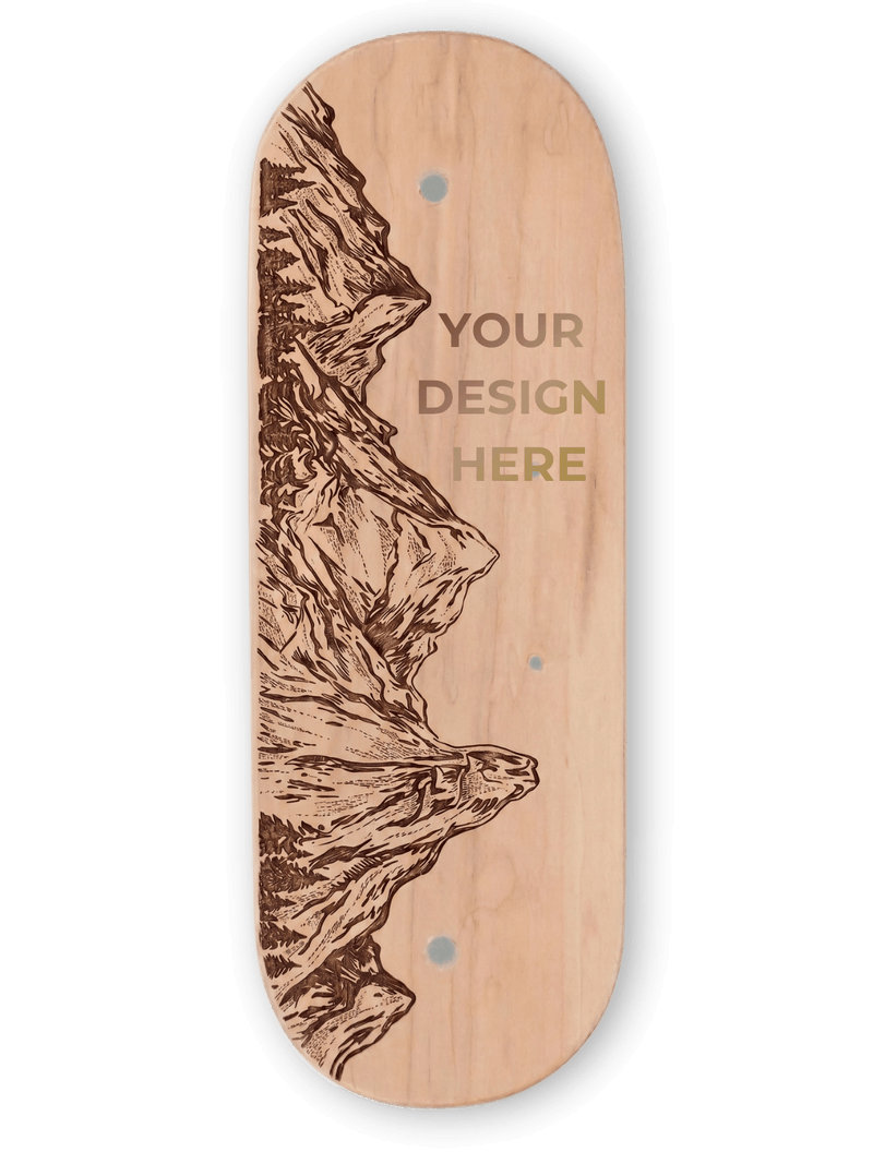 Wooden Whirly Board deck with mountain engraving and 'Your Design Here' text