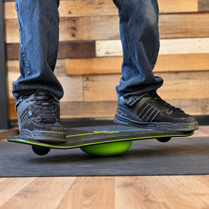 Green MagLock3 ball under a Whirly Complete board with a rider balancing