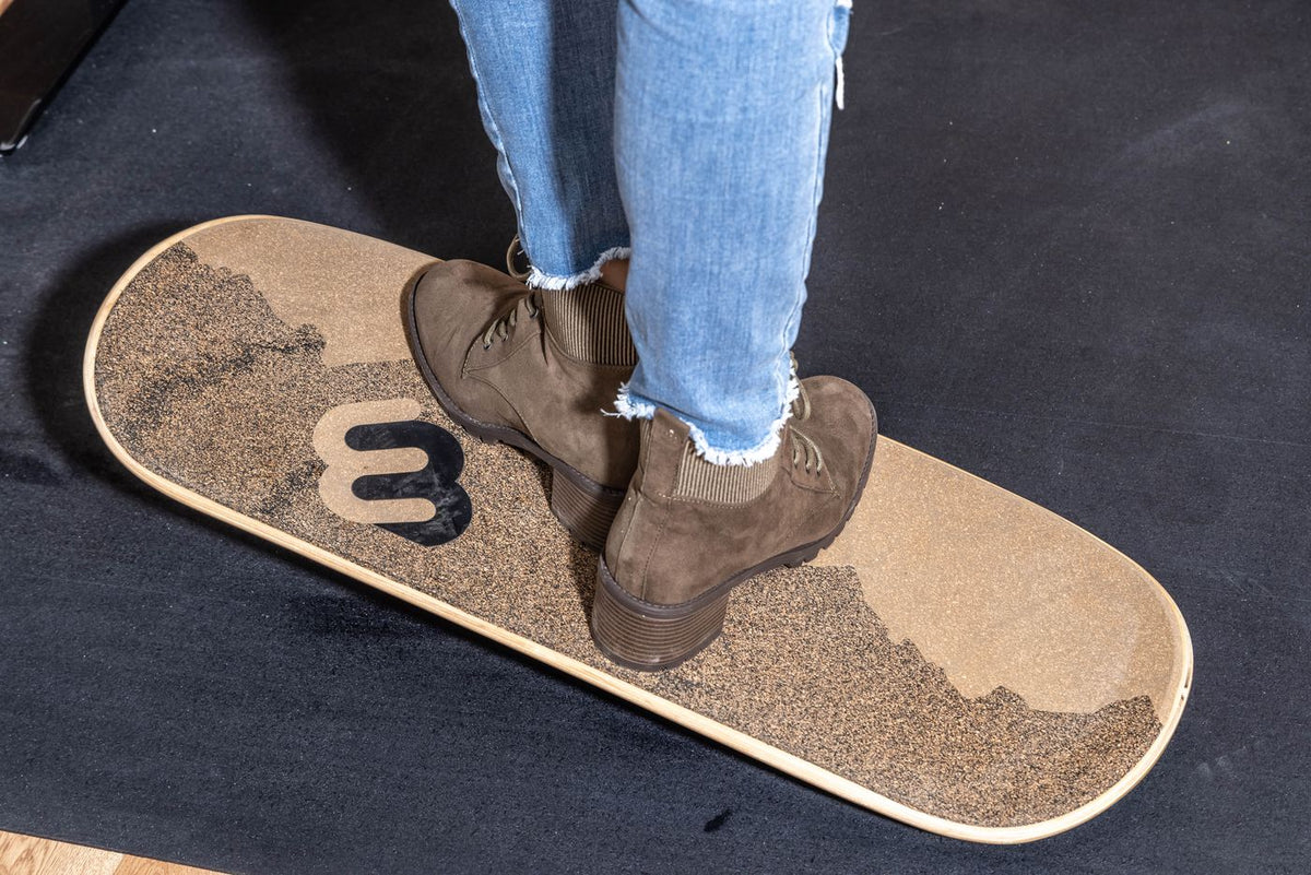 Boots on a Desk Rider at a standing desk