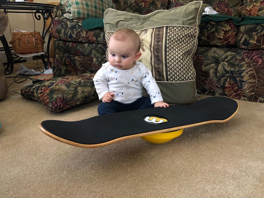 Baby Lander sitting on a Whirly Board