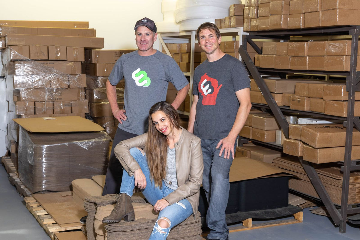 The Whirly Board team in the warehouse
