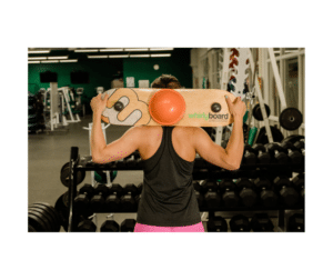 Woman prepping for sports performance training with a Whirly Board